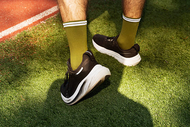 istock Runners hang out at a public running track 2252984824