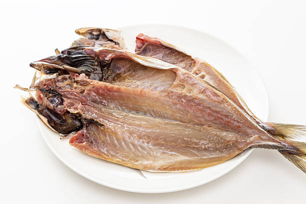 istock Dried horse mackerel on a plate on a white background 2252986830