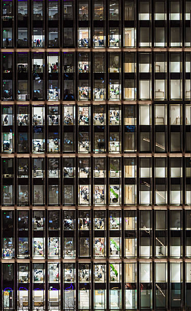 istock Business People Working in Office Building at Night 2252988321