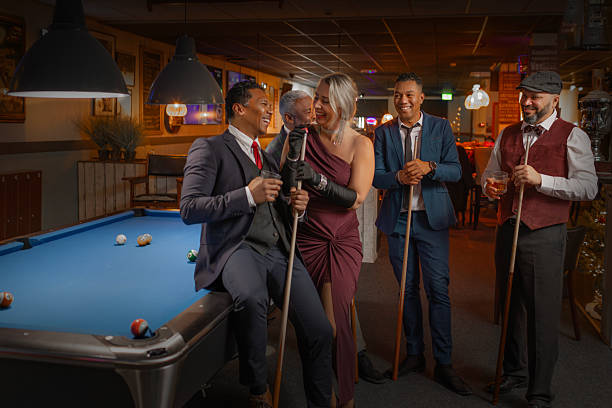 istock Group of diverse elegant senior friends at a pool hall 2252989726