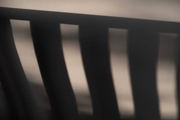 istock Soft, blurred shadows dance across a surface, creating an enigmatic ambiance reminiscent of twilight in an indistinct location 2252990811
