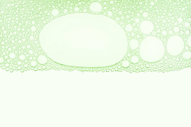 Cosmetic green cleansing washing soapy foam gel neutral isolated background