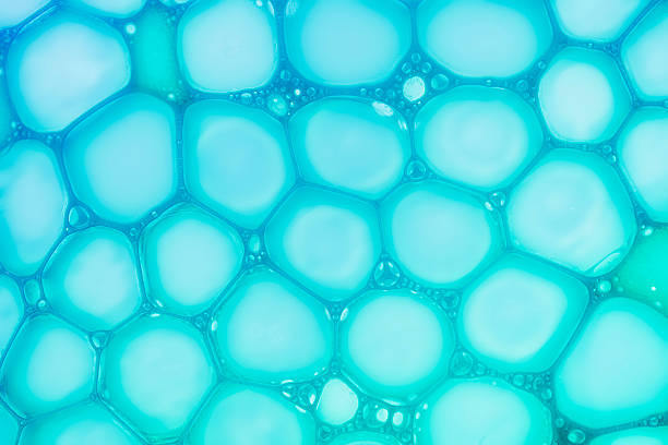 Cosmetic blue translucent cleansing washing blue soapy foam gel on neutral isolated background