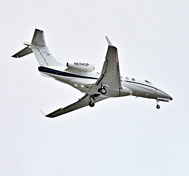 Boca Raton, Palm Beach County, Florida, USA, December 18, 2025.  An Embraer fixed wing multi engine (8 seats / 2 engines)N654UP enroute to Boca Raton Airport.