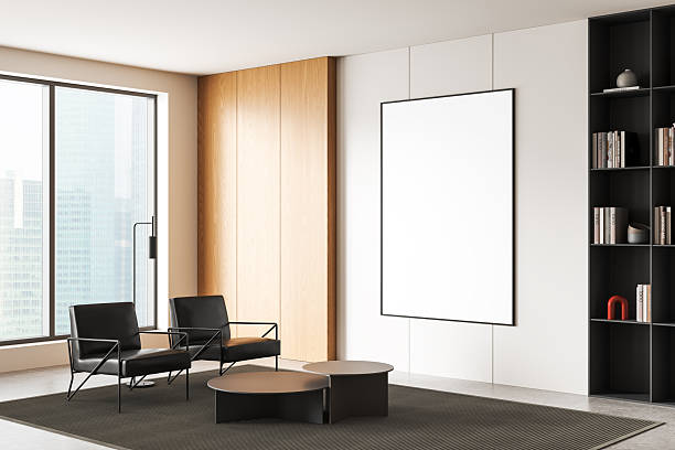 istock Modern interior with blank poster mockup on clean wall in bright minimalist room featuring framed canvas, chairs, and shelving unit display setup. 3D Rendering 2253000188