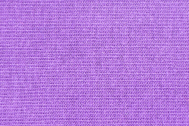 Cotton texture pattern closeup. Macro shot purple cotton texture background. Knitting pattern of cotton. Texture of fabric