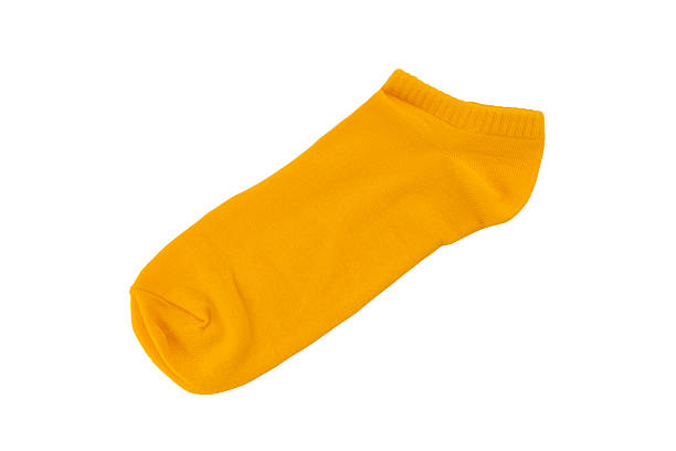 istock Yellow sock isolated on white background. Sock on white background. Colored socks isolated 2253008863