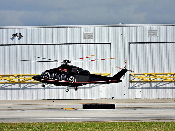 Ft. Lauderdale, Broward County, Florida, USA, December 19, 2025.  A Bell helicopter (17 seats / 2 engines) N50HR Seminole Hard Rock taking off from the Ft. Lauderdale-Hollywood Airport.