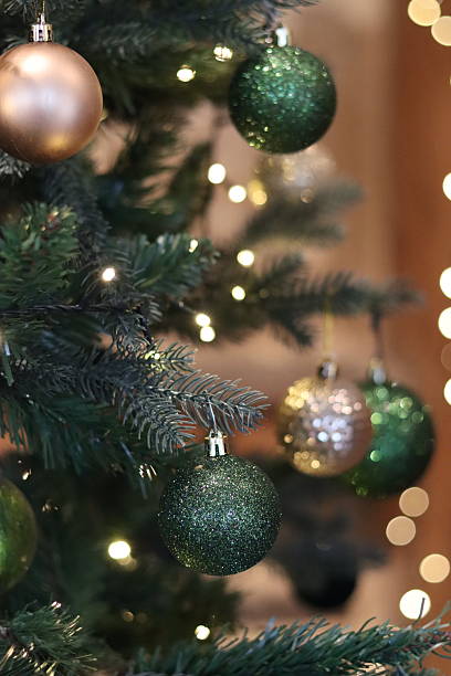 istock Baubles and decorations on a traditional Christmas tree 2253017181