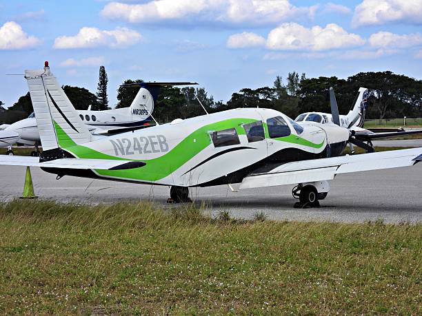 Pompano Beach, Broward County, Florida, USA, December 19, 2025. A Piper fixed wing single engine (6 seats / 1 engine) N242EB parked at the Pompano Beach Air Park.