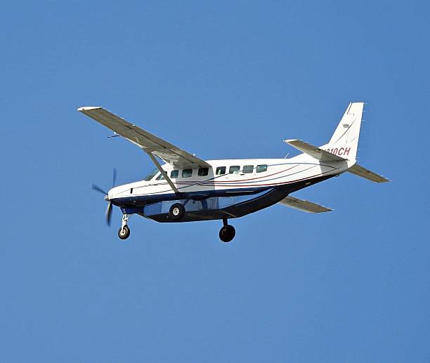 Ft. Lauderdale, Broward County, Florida, USA, December 19, 2025. A Cessna 208B fixed wing single engine (12 seats / 1 engine) N310CH taking off from the Ft. Lauderdale Executive Airport.