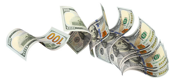 istock Flying hundred dollar bills, isolated on white background 2253026994