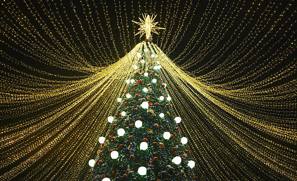 istock Christmas tree with tent-shaped garlands 2253028469