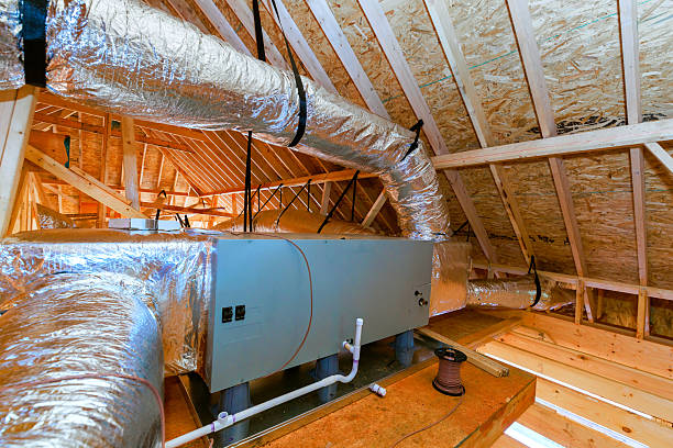 istock Installation of HVAC system in attic space during home construction process at residential building 2253029734