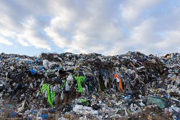 istock A mountain of trash is piled high with plastic bags and other garbage 2253030413