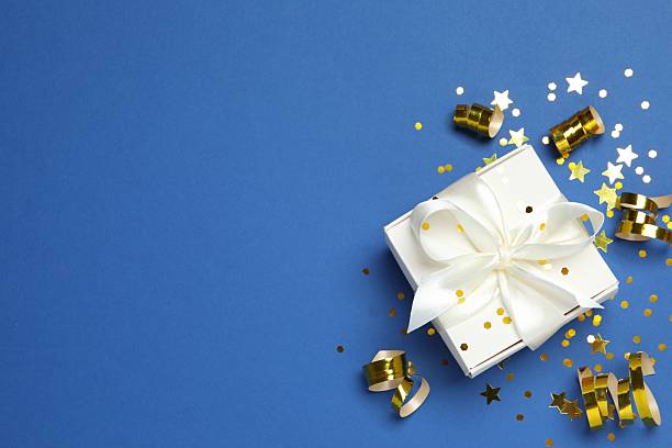 istock Beautiful festive gift box on color background 2253031901