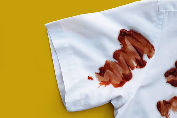 istock White shirt stained with spilled tomato sauce 2253032732