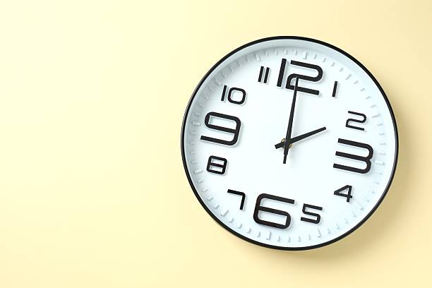 istock Big beautiful stylish clock on beige background 2253033466