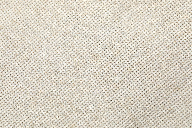 Close-up detail of fabric natural color Hemp material pattern design wallpaper. can be used as background or for graphic design