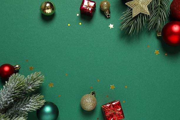 istock Beautiful Christmas decorations on green background 2253034888