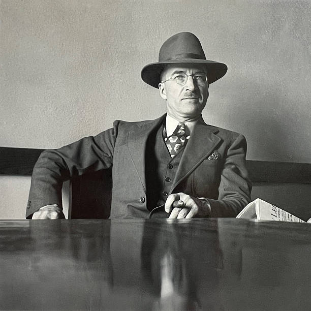 istock Man in Suit and Hat in 1940s Black and White 2253035776