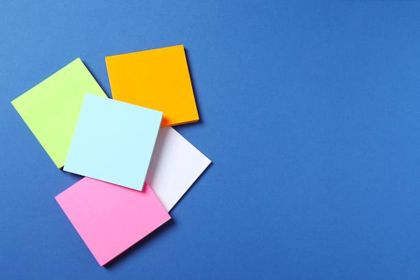 istock Multicolored paper stickers on a color background 2253038282