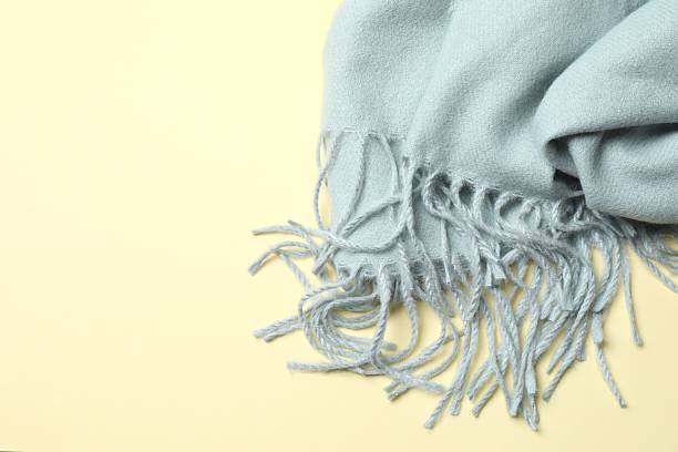 istock Warm scarf on a color background 2253038305