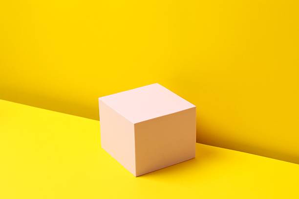 istock Pink podium on a yellow background 2253038959