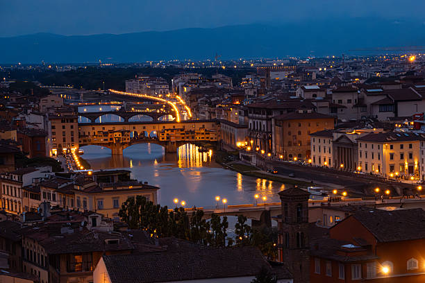 Florence, Italy. May, 19, 2022, Aerial view of Ponte Vecchio and Arno River at night. Panoramic view from piazzale Michelangelo, Florence, Tuscany, Italy