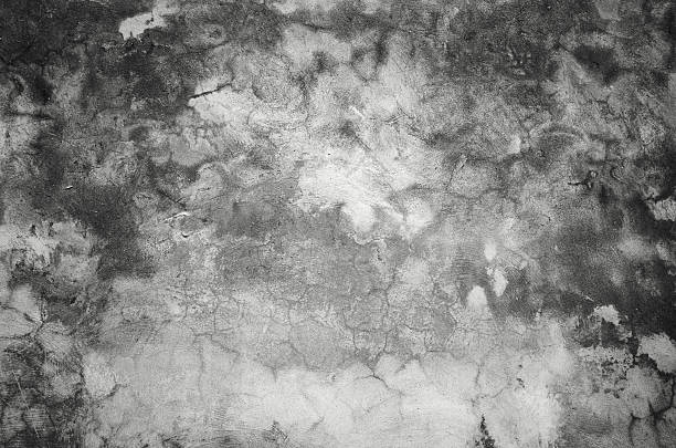 Gray dark concrete old grunge cracked wall texture background. Full frame