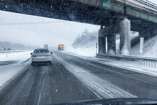 istock Expressway Snow Plow Truck During Winter Snow Blizzard 2253041523