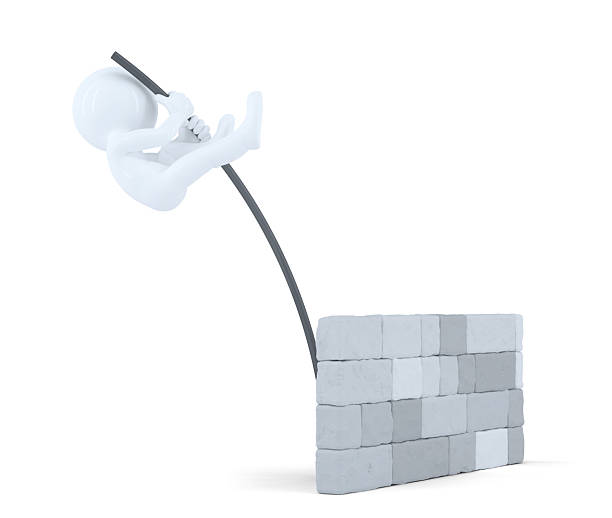 3D man jumps over the wall. Isolated. Contains clipping path