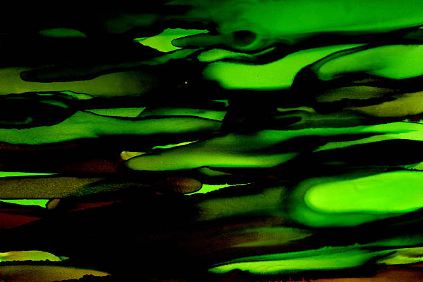 istock dark background in green and yellow colors 2253042426