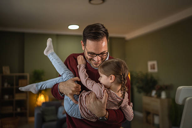istock Father daughter playing having fun at home 2253047104