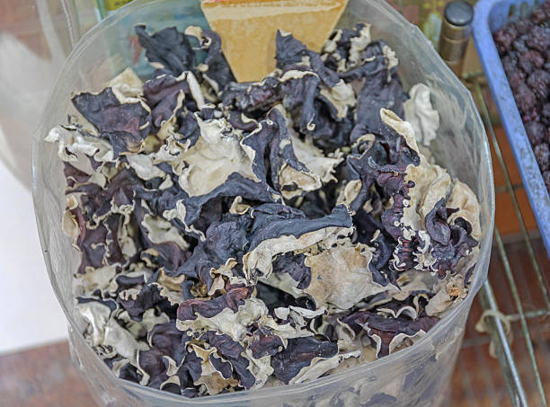 Chinese dried mushooms or fungus closeup background effect.