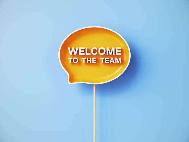 istock Welcome to the Team Written on Orange Speech Bubble Over Blue Background 2253049809