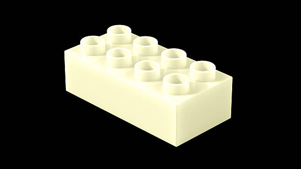 istock Cream Plastic Building Brick Isolated on a Black Background. 2253051793