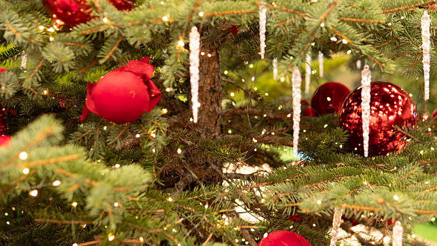 Decorative evergreen branches with glowing ornaments, Nostalgic living room scene showcasing decorated evergreen branches reflecting warm light ambiance