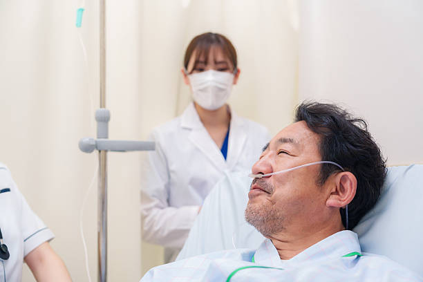 istock Doctor and nurse interviewing a hospitalized patient 2253058138