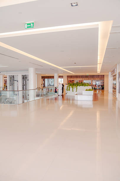 istock Middle Eastern Three Generation Family Walking Together in Modern Shopping Mall Interior 2253058284