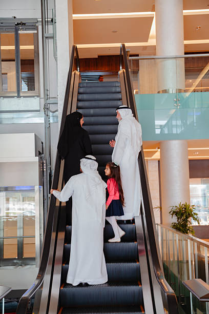 istock A Middle Eastern three generation family spending time together inside a modern shopping mall 2253058300