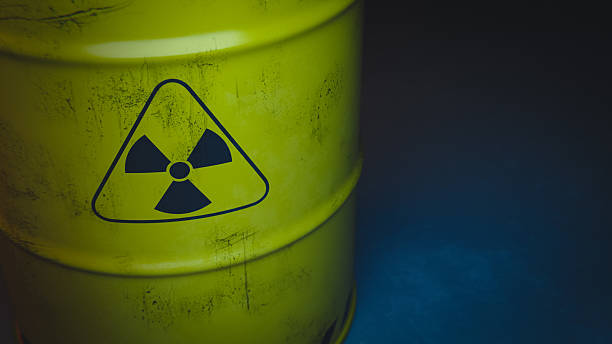 istock Yellow radioactive waste barrel with copy space. 3d rendering 2253058654