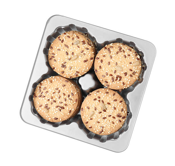 istock Cereal crackers with flax, sunflower and sesame seeds isolated on white, top view 2253061069