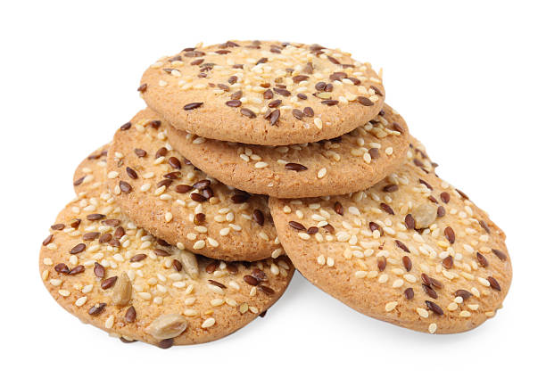 istock Round cereal crackers with flax, sunflower and sesame seeds isolated on white 2253061606