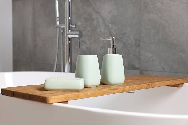 istock Set of bath accessories on tub in bathroom 2253063946