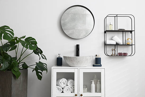 istock Different bath accessories, personal care products and bathroom vanity indoors 2253063961