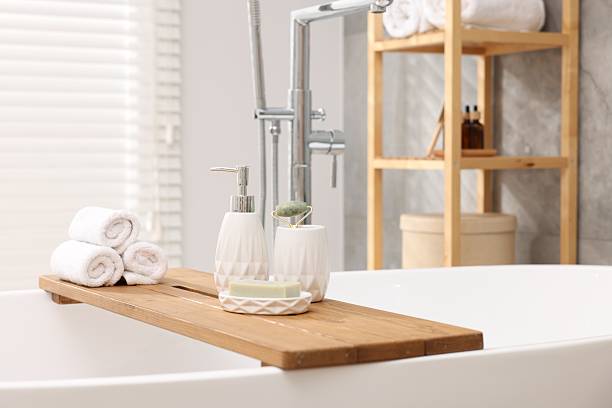 istock Different personal care products on bath tub in bathroom 2253064037