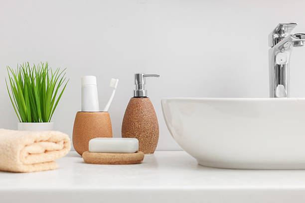 istock Set of different bath accessories and products on white table 2253064063