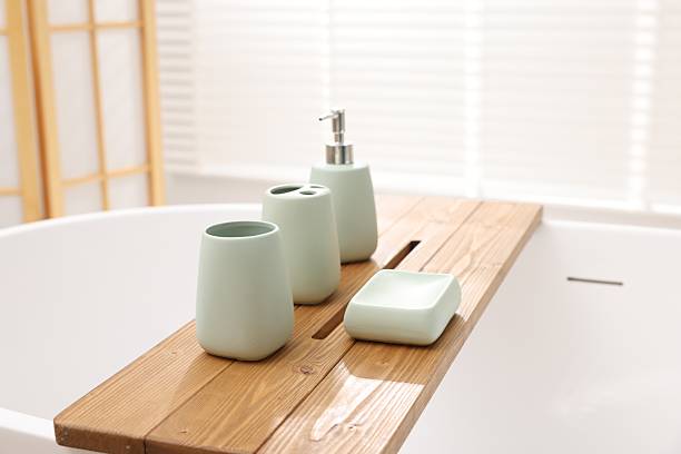 istock Set of bath accessories on tub in bathroom 2253064606