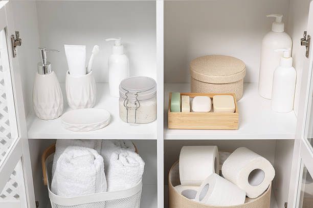 istock Different personal care products and bath accessories in bathroom vanity 2253064623